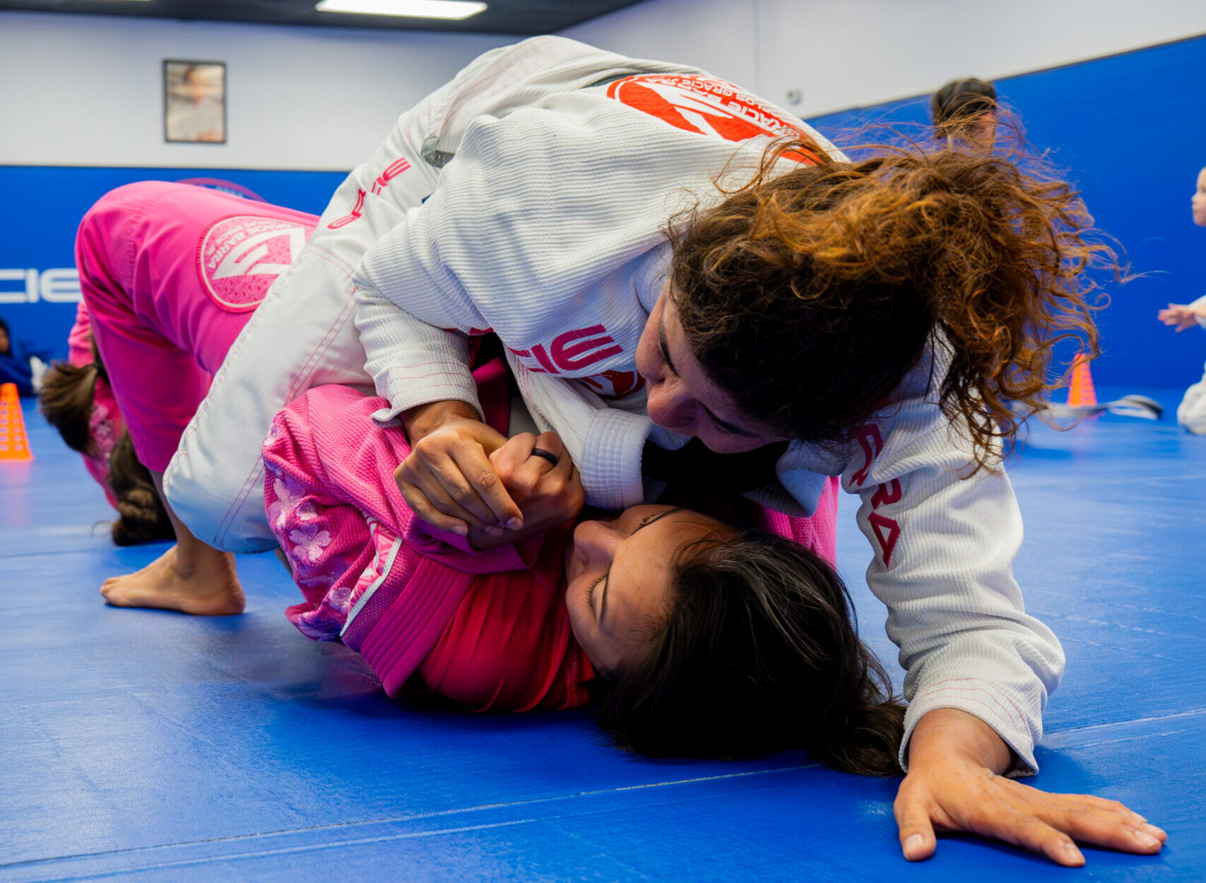 women training bjj and self-defense